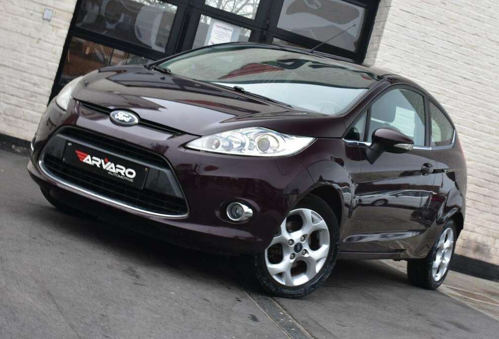 Ford 1.25i Titanium / Xenon / Airco / PDC / Garantie