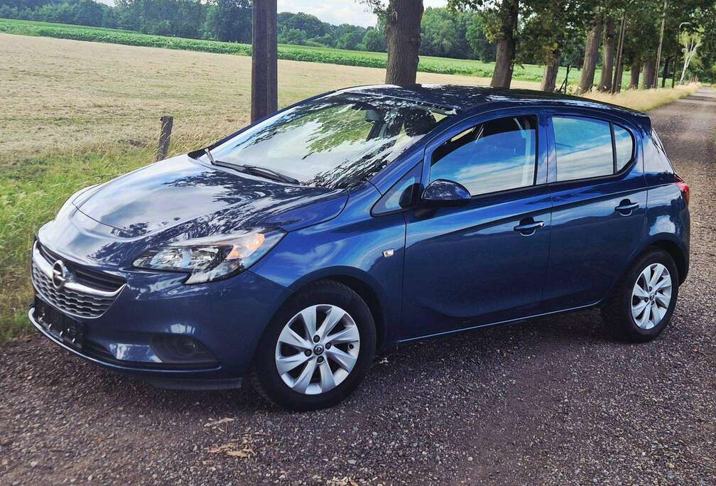 Opel Corsa 1.2i-PDC-Bluetooth-Dagrijverlichting-12MGAR