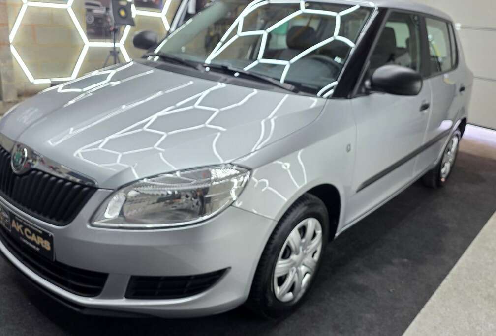 Skoda 1.2 active,essence ,Vitres électriques, climatisat
