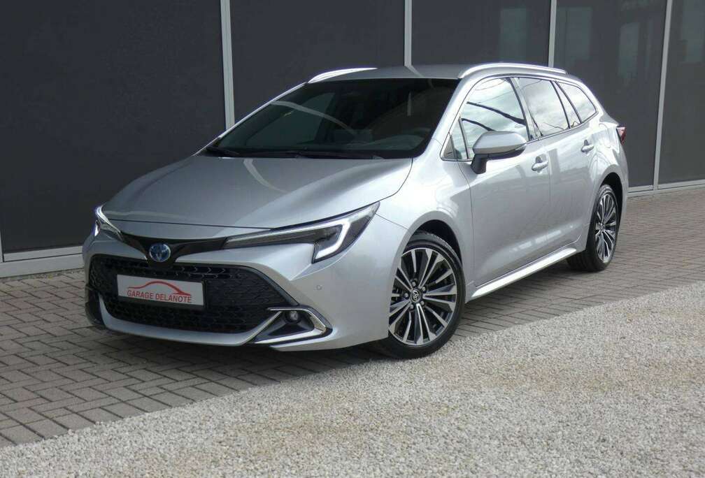 Toyota 1.8 Hybrid STYLE+TECH PACK 140pk +Elektrische koffer +Dodehoek +Stuurwielverwarming +Zetelverwarming +Half leder +GPS